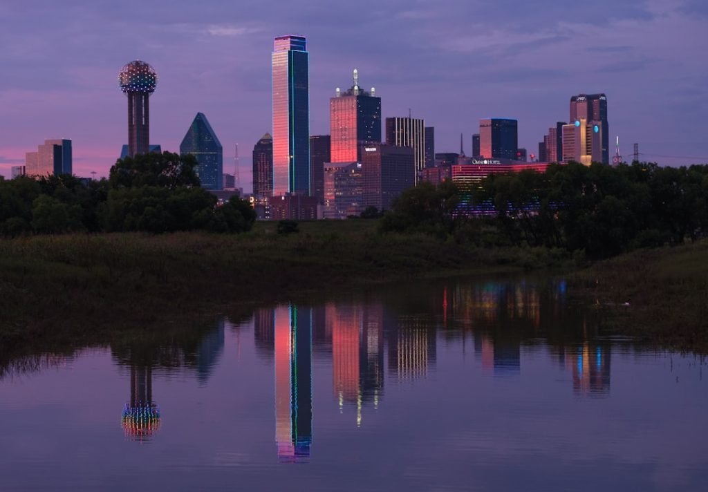 Evening sunset view of Downtown Dallas from across the Trinity River.